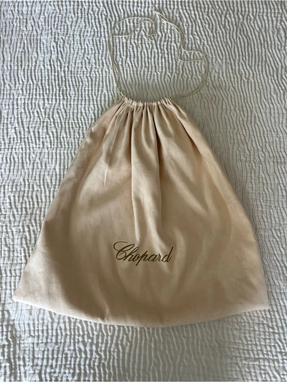 Chopard beige storage dust bag with gold script